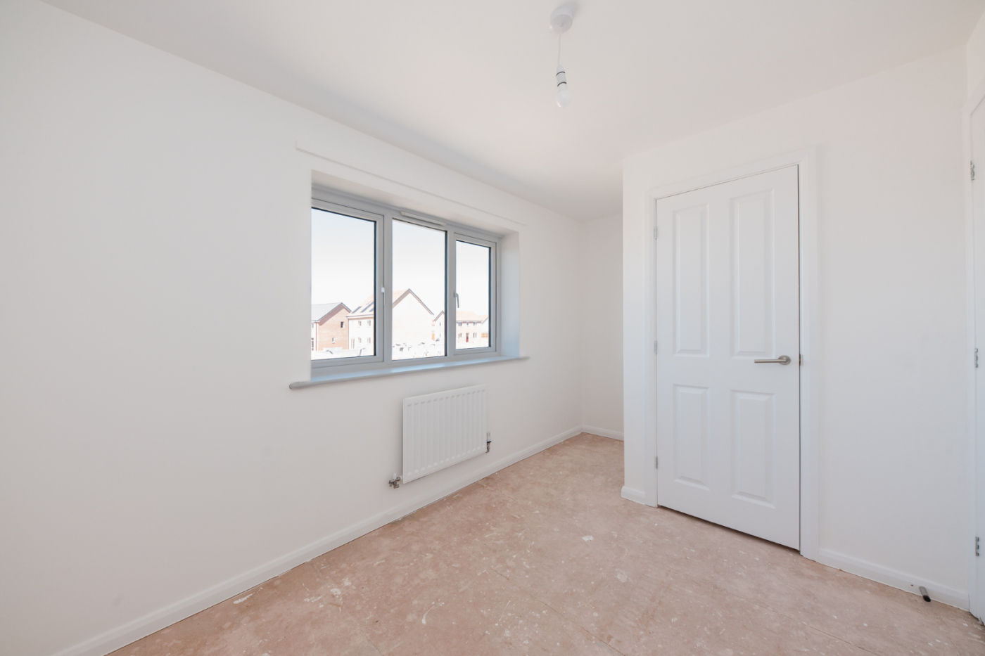 Empty bedroom space with closet