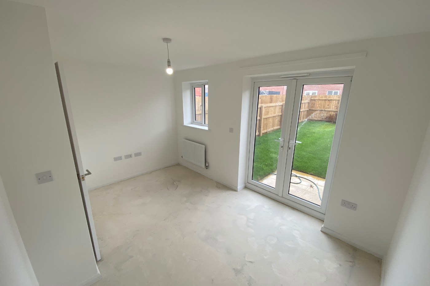 Lounge space with patio doors to the garden