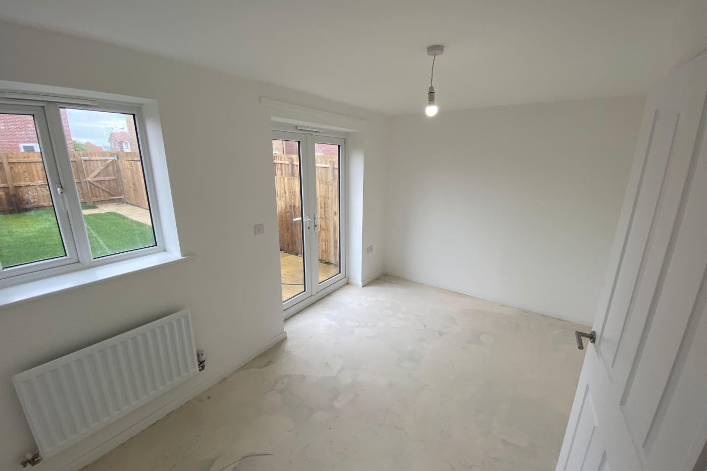 Lounge space with patio doors to the garden