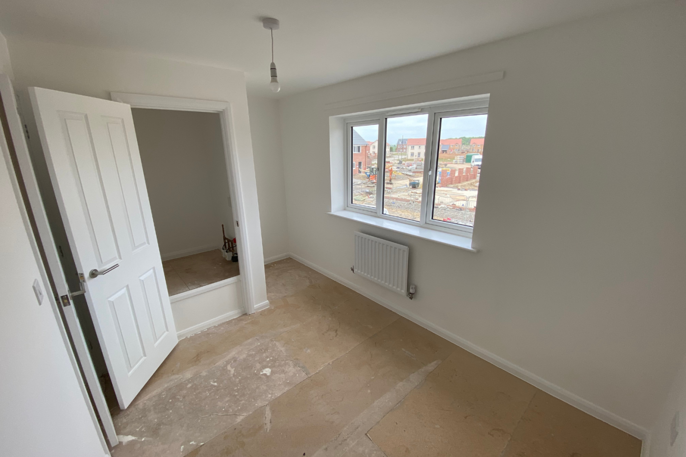 Empty bedroom space with cupboard