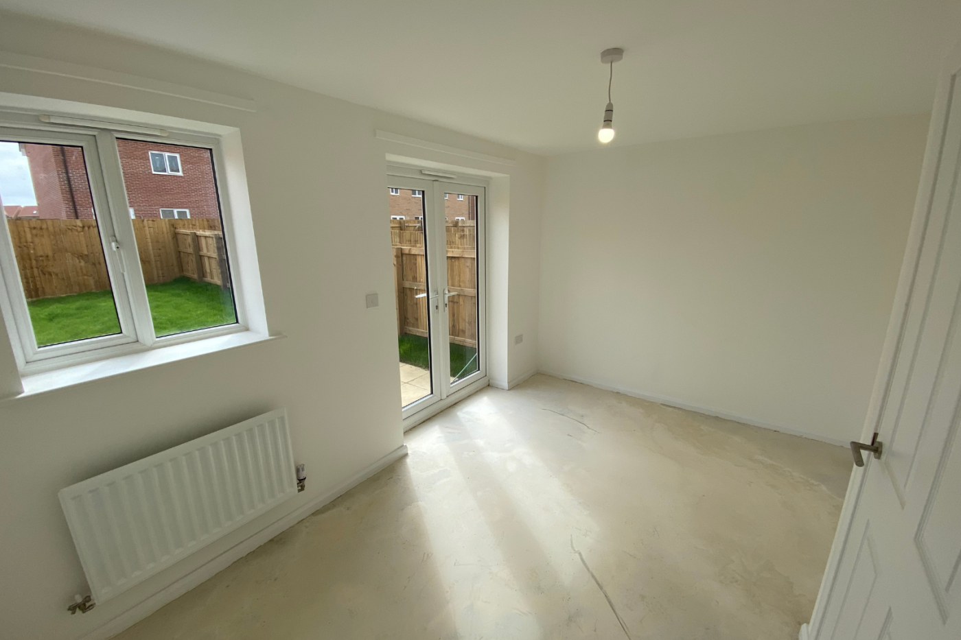 Lounge space with patio doors to the garden