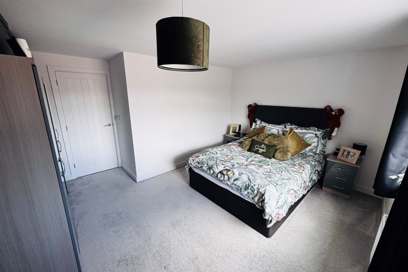 Bedroom with double bed and wardrobe