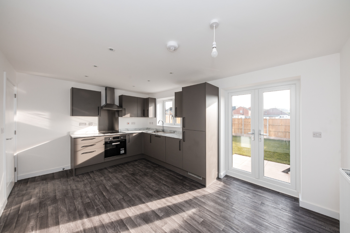 Kitchen and dining space with patio doors out to the garden