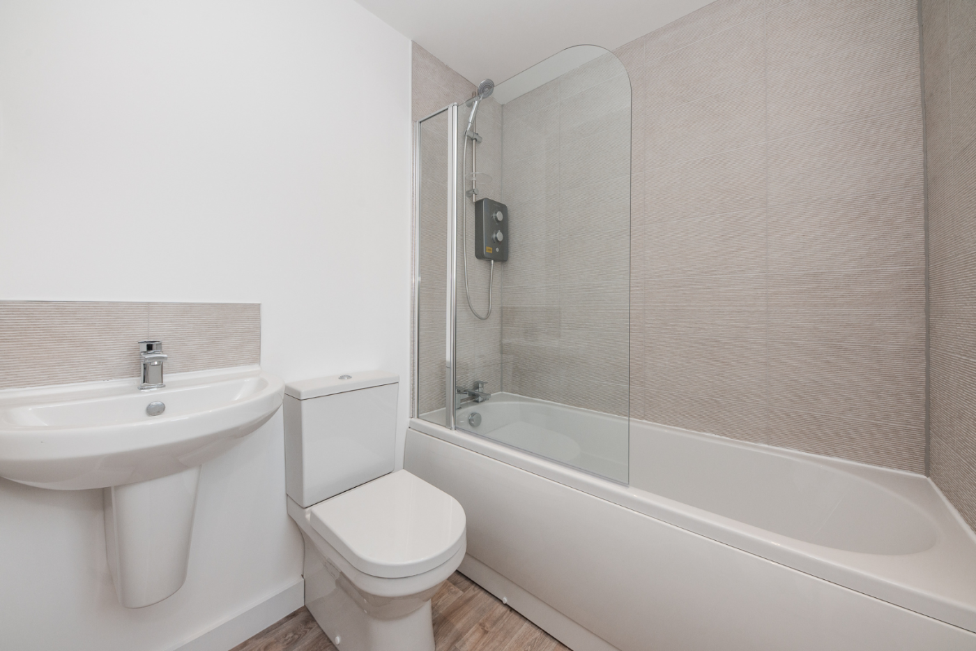 Family bathroom with bath and shower, toilet and handbasin