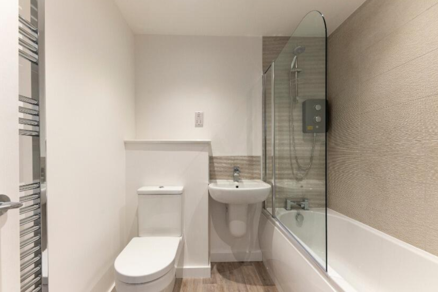 Upstairs bathroom showing toilet, sink, and shower