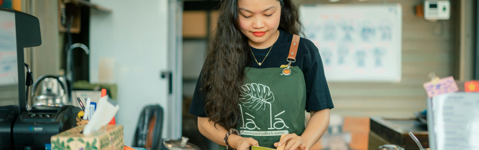 A woman working in a cafe