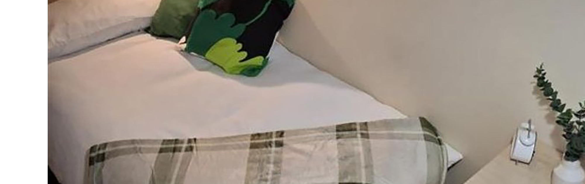 Student bedroom with bed, wardrobe and desk