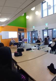 A classroom with students learning