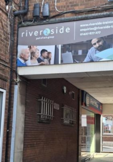 The entrance to Riverside Training in Gainsborough showing the door and a sign