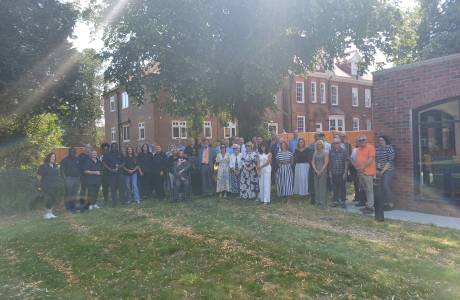 A group of people gather at Grange House in Market Rasen to celebrate the opening of Acis Group's Grange Collective