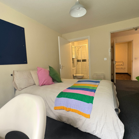 Bedroom with 3/4 bed, desk and wardrobe