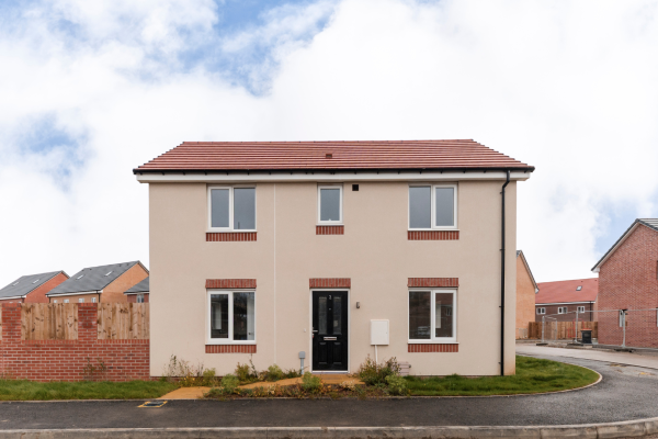 Front of the house showing pavement, doors and window