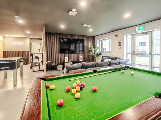 Student common room with pool table and parcel lockers