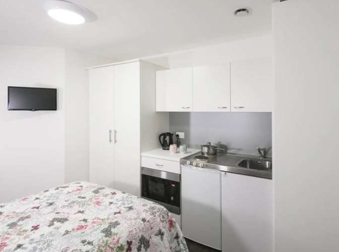 Student bedroom with kitchenette