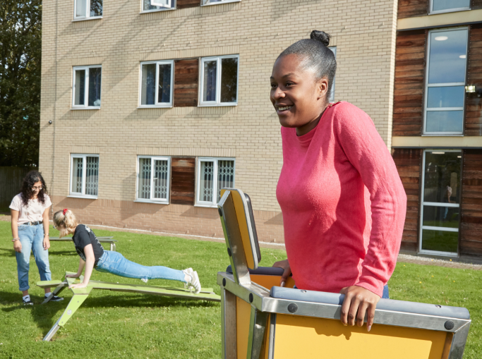 Student using outside gym