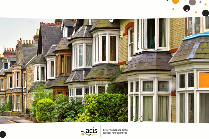 A row of terraced houses on a street