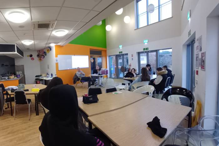 A classroom with students learning