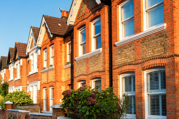 A row of terraced houses in a street