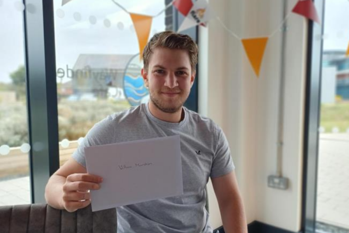 A Flare student showing their GCSE results at Clip Mablethorpe
