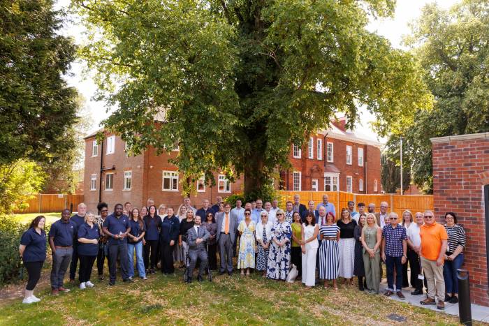 A group of people gather at Grange House in Market Rasen to celebrate the opening of Acis Group's Grange Collective