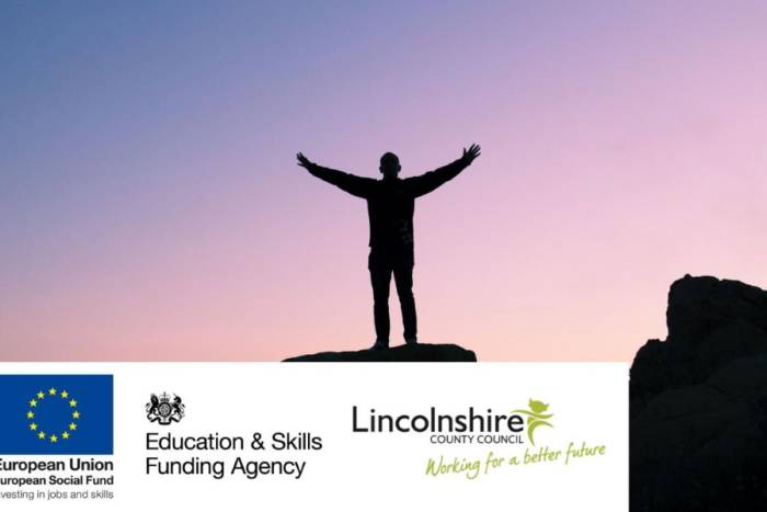 Man with arms in the air