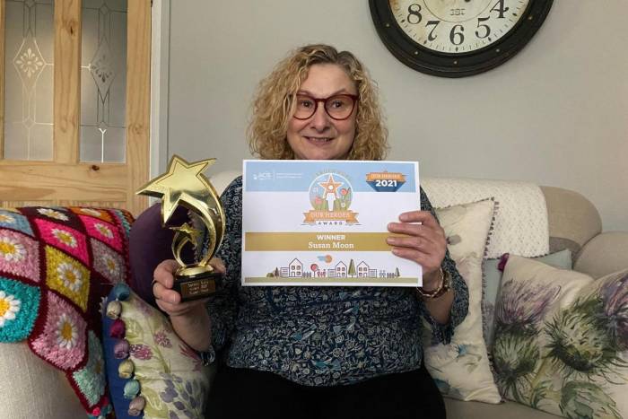 Susan with Our Heroes Award