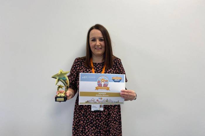 Adelle with Our Heroes Award