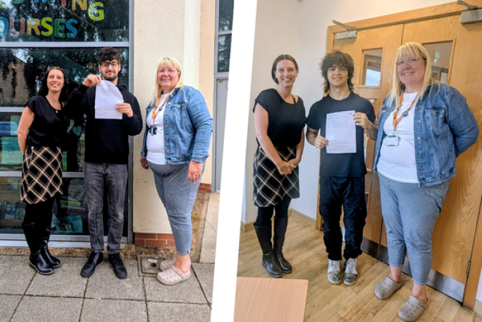 Two students with their GCSE results and tutors