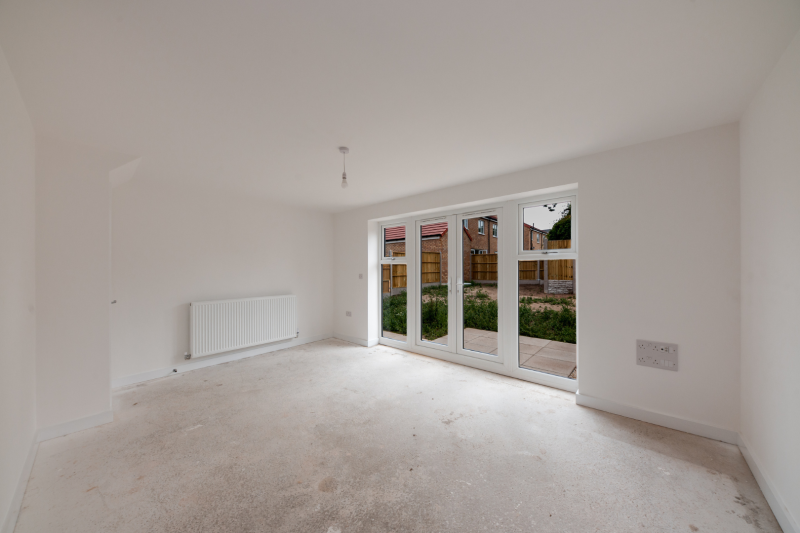 Living area with doors out into the garden