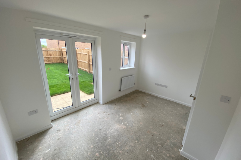 Lounge space with patio doors to the garden
