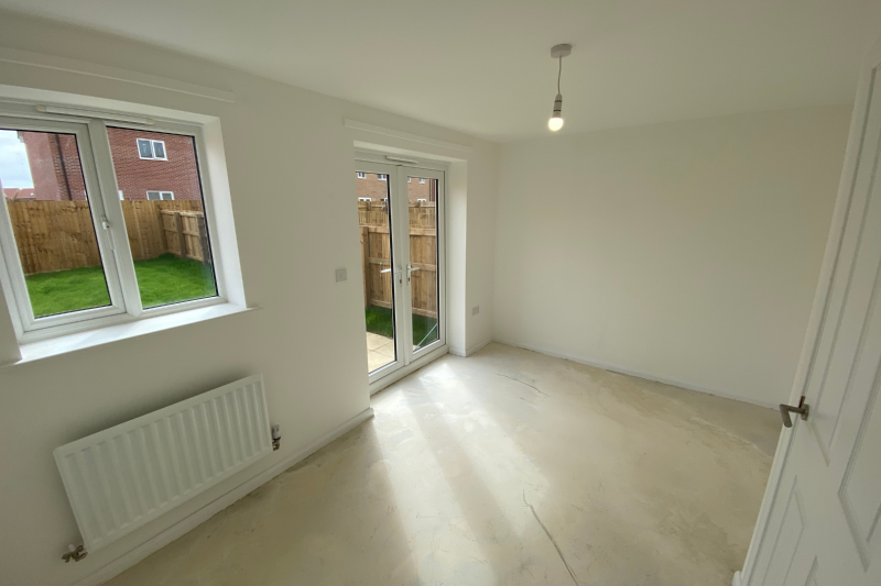 Lounge space with patio doors to the garden