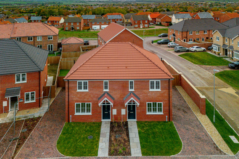Drone photograph of two semi detached houses 
