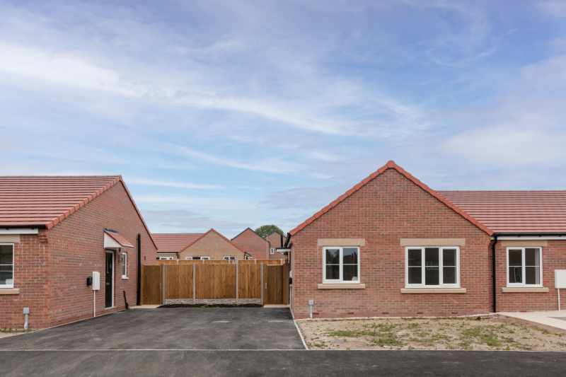 Front of a terraced bungalow and drive