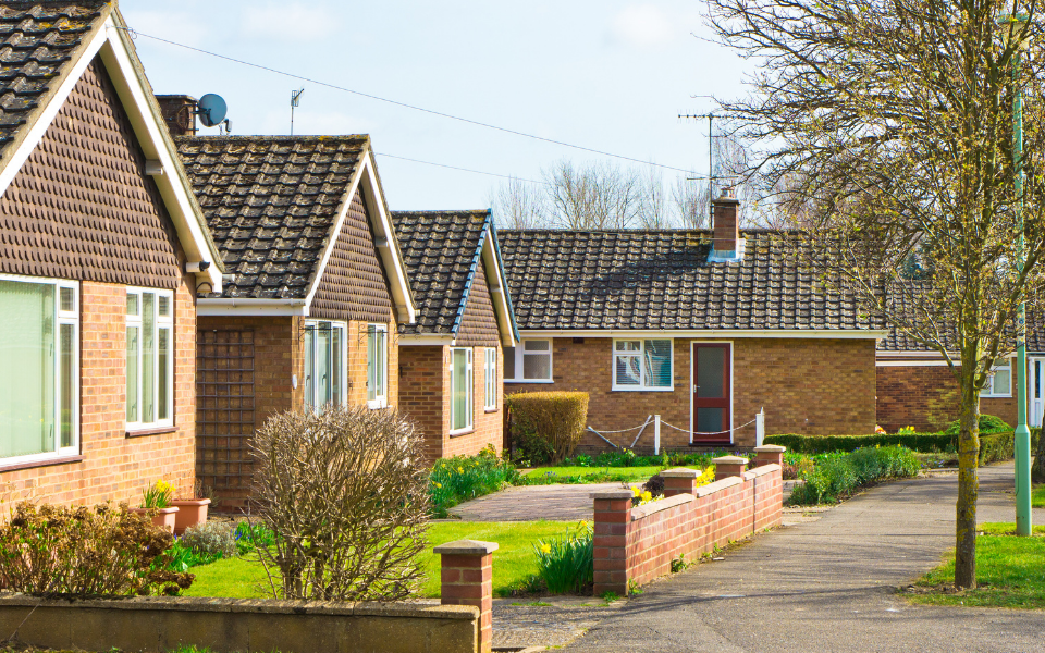 A row of bungalows in the sunshine