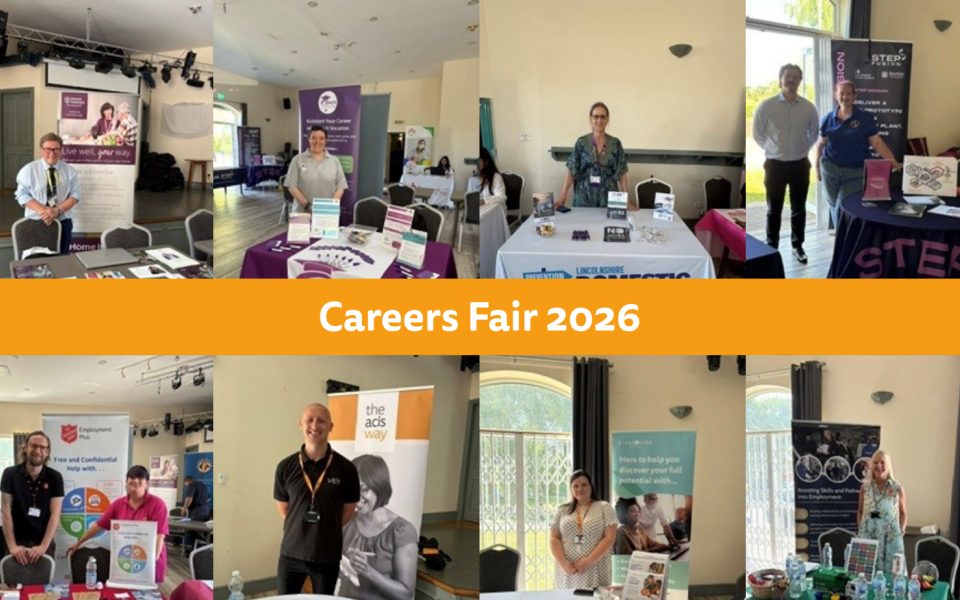 various people at stands at a careers fair