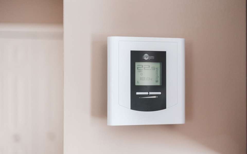 Thermostat on wall