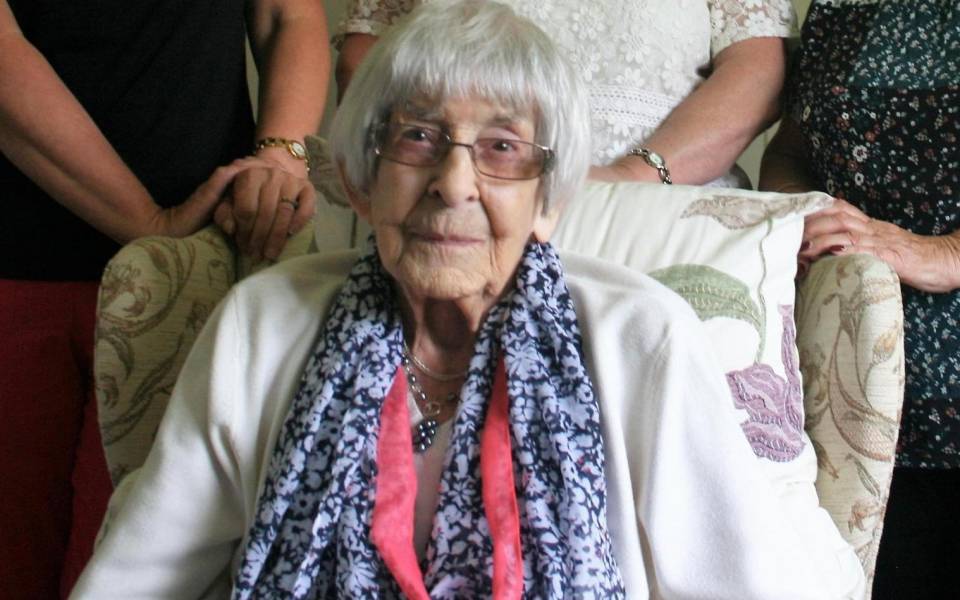 Elderly lady sitting in a chair