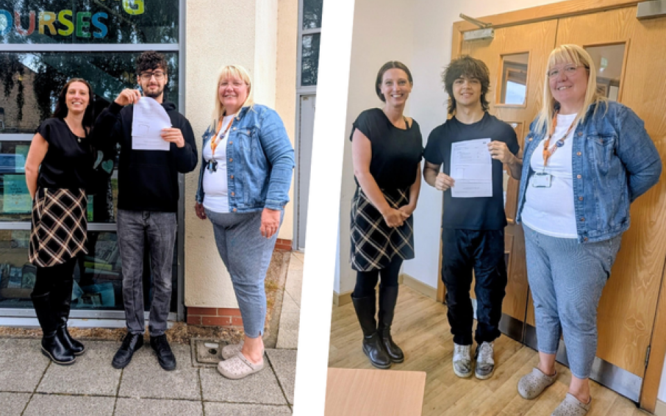 Two students with their GCSE results and tutors