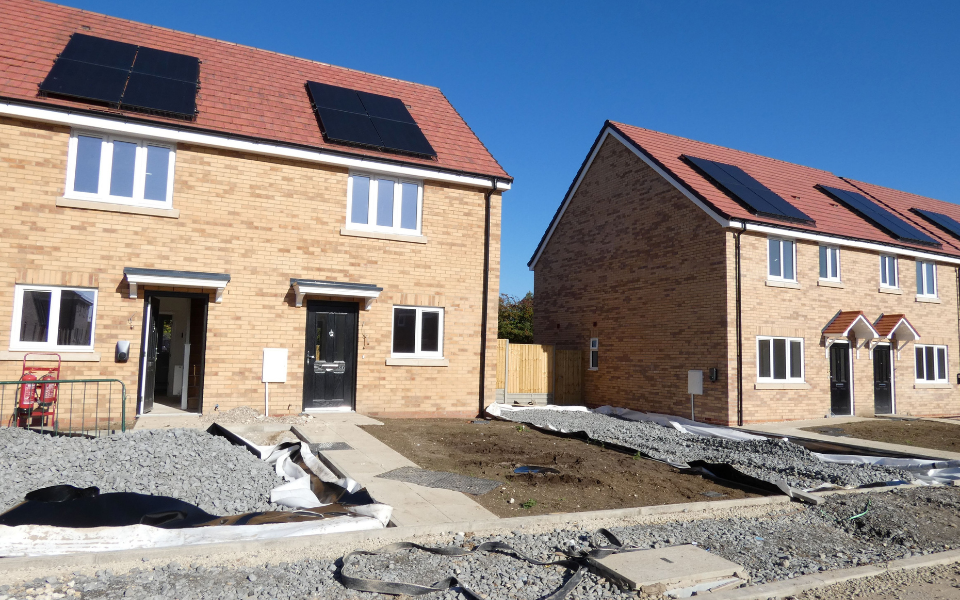 A row of semi detached homes being built