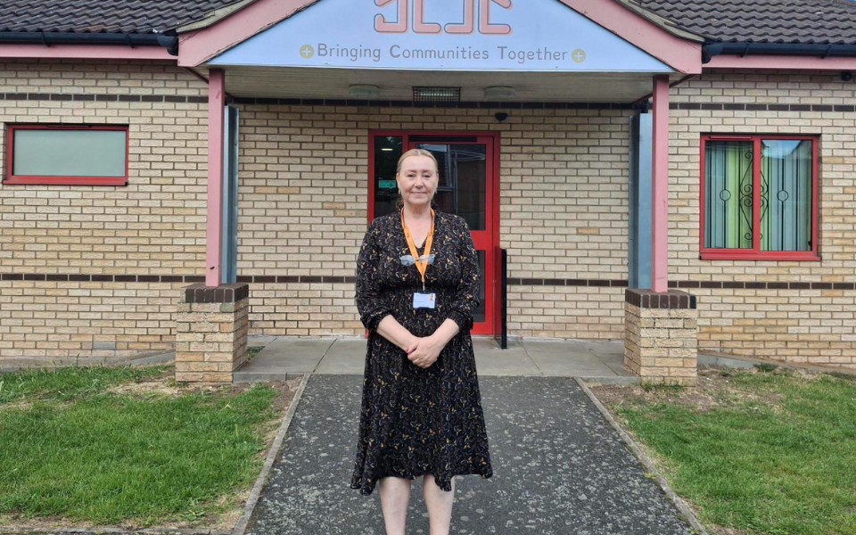 Paula is stood in middle of the entrance to Gainsborough Uphill Community Centre