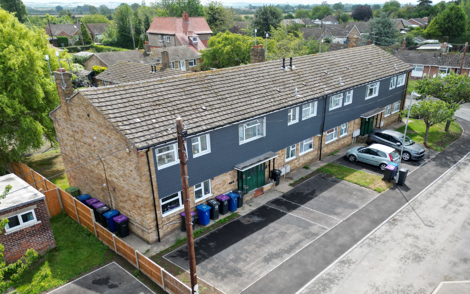 Several parking spaces outside the flats