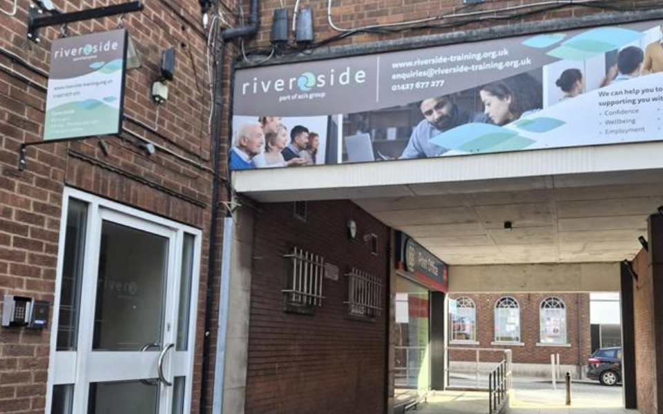 The entrance to Riverside Training in Gainsborough showing the door and a sign